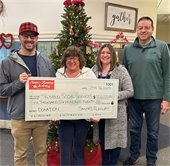 Check presented to Social Services